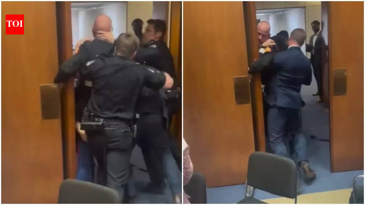 ईरान युद्ध के खिलाफ पूर्व नौसैनिकों के विरोध ने टकराव को जन्म दिया: क्या सेन टिम शेही ने ब्रायन मैकगिनिस की बांह तोड़ दी?